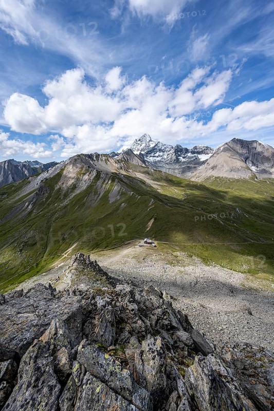 Summit of Kastenegg, view of picturesque mountain landscape with snow-covered summit of the Großglockner, Vienna High Trail, Schober Group, Hohe Tauern National Park, Carinthia, Austria
