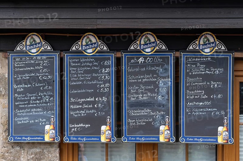 Food offers written on blackboards in front of a restaurant, Bavaria, Germany