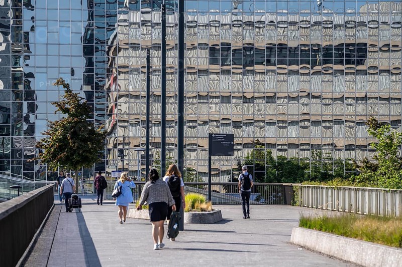 Reflecting facade of the Rabobank building at the central station, Utrecht Centraal, Netherlands
