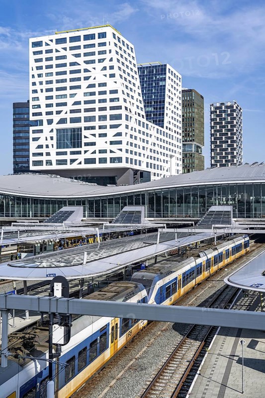 Utrecht Centraal railway station, tracks and concourse, trains of Nederlandse Spoorwegen N.V. state railway company, office building in the city centre, Netherlands