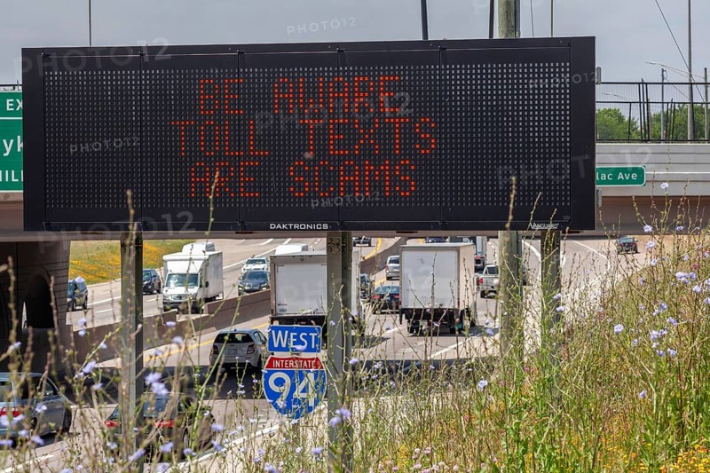 Detroit, Michigan - A message on an electronic road sign on Interstate 94 warns drivers about common scams that demand payment for using toll roads