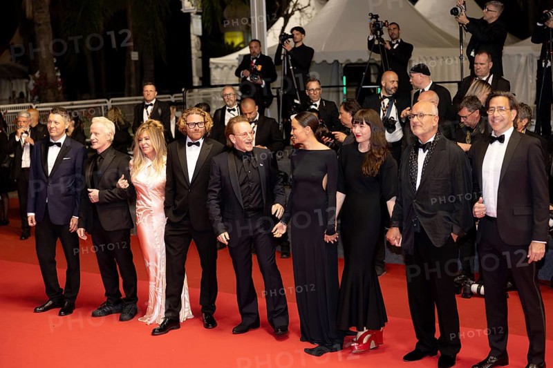 Cannes, France - 16.5.2024: Jacknife Lee, Dede Gardner, Erik Messerschmidt, Bono, Kelly McNamara, Jennifer Pitcher, Jon Kamen, David Sirulnick on the red carpet during the 78th Cannes International Film Festival. The 78th Cannes International Film Festival will take place from 13 to 24 May 2025
