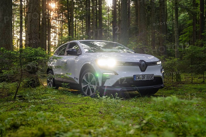 White car standing in the sunlight in the green forest, Renault Megane, Deer E Carsharing, electric car, Calw, Black Forest, Germany