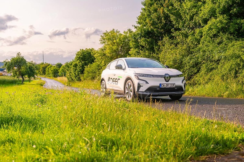 Renault car on a road, surrounded by green trees and meadows, Renault Megane, Deer E Carsharing, electric car, Calw, Black Forest, Germany