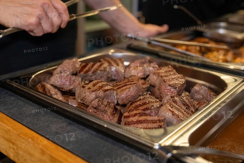 Several pieces of grilled meat in a buffet tray in a kitchen, ready to serve, event and wedding location Kloster Lorch, Lorch, Germany