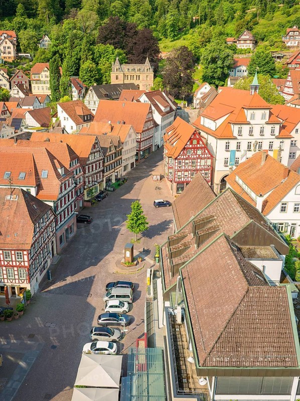 Historic street with half-timbered houses and a small market square, Calw, Black Forest, Germany