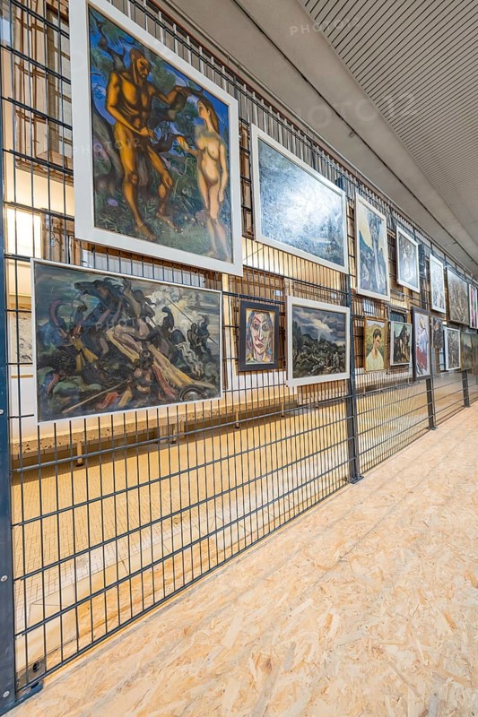 Gallery wall with various paintings in a modern art gallery ambience, historical art exhibition in the old swimming pool, show depot, Calw, Black Forest, Germany