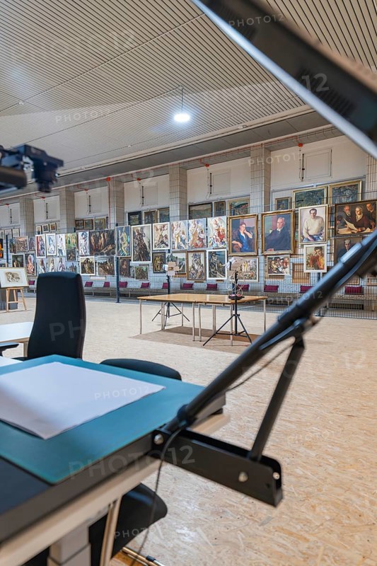 Exhibition gallery with artworks, stands and tables in the interior, historical art exhibition in the old swimming pool, show depot, Calw, Black Forest, Germany