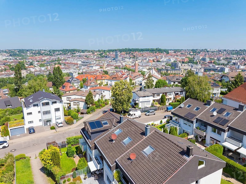 Bird's eye view of a residential neighbourhood with tiled roofs against an urban backdrop, roof renovation, house construction, Pforzheim, Germany