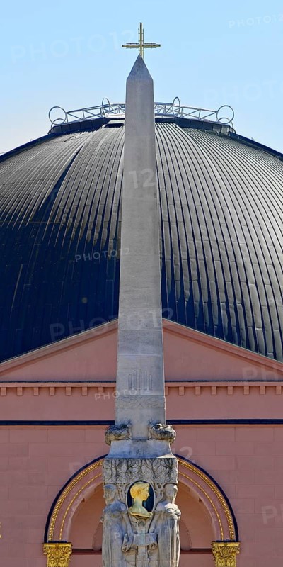 Alice monument, also known as Alice obelisk, in front of the dome of St Ludwig's, the main Catholic church in Darmstadt, Hesse, Germany