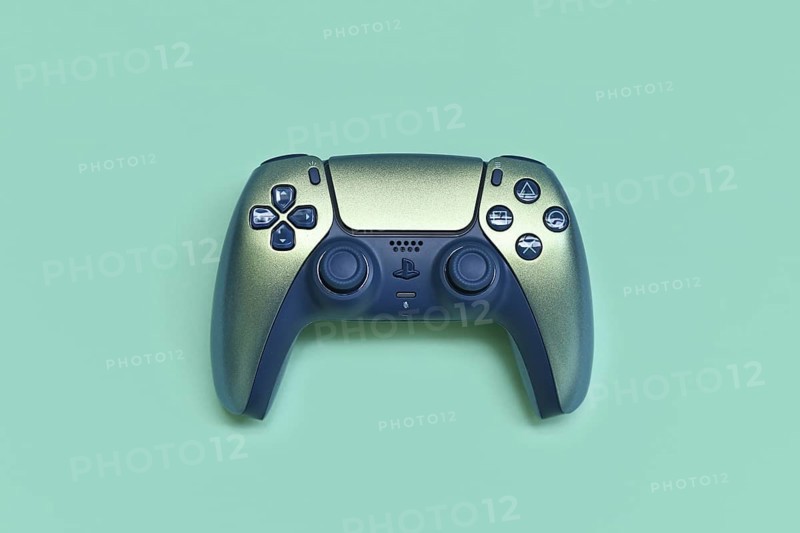 Germany - May 2025: Sony DualSense Wireless Playstation 5 Controller in Chroma Teal color on turquoise background