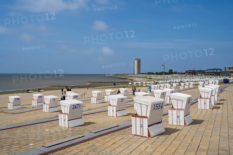 Beach chairs on paved coast, promenade, Büsum, North Sea, Schleswig-Holstein, Germany