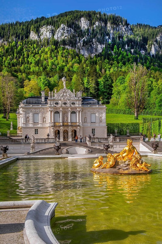 Water parterre with flora fountain and the portal of Linderhof Castle in spring, municipality of Ettal, Ammergau Alps, Ammertal, Upper Bavaria, Bavaria, Germany