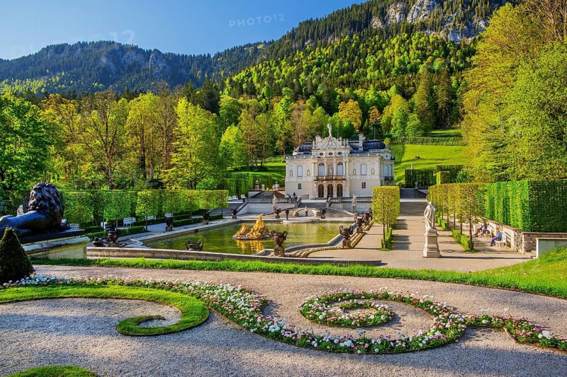 Water parterre with the portal of Linderhof Castle in spring, municipality of Ettal, Ammergau Alps, Ammertal, Upper Bavaria, Bavaria, Germany