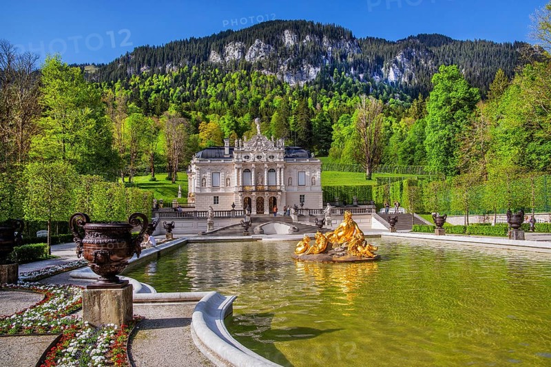 Water parterre with flora fountain and the portal of Linderhof Castle in spring, municipality of Ettal, Ammergau Alps, Ammertal, Upper Bavaria, Bavaria, Germany