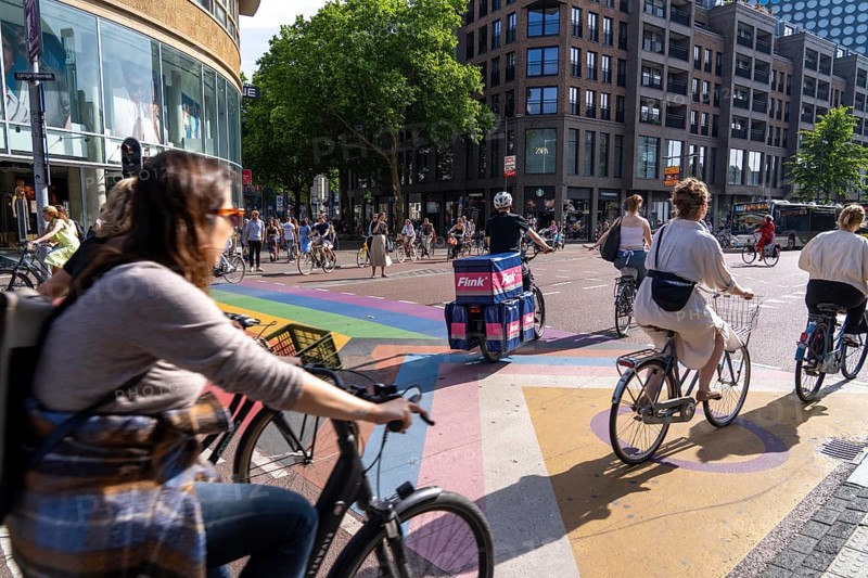 Central cycle path along the Vredenburg, in the city centre of Utrecht, lanes for pedestrians, cyclists and local traffic are separated, dense traffic, no car/truck traffic, Utrecht, Netherlands