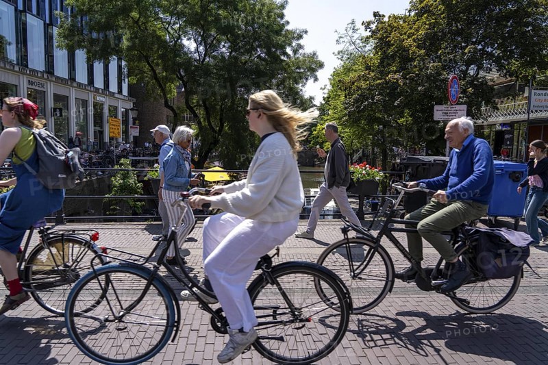 Central cycle path on the Lange Viestraat, lanes for pedestrians, cyclists and local traffic are separated in the city centre, dense traffic, no car/truck traffic, Utrecht, Netherlands