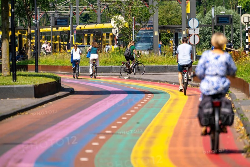 Rainbow cycle path through the university campus in Utrecht Science Park, 570 metres long, Utrecht University, the Utrecht University of Applied Sciences and UMC Utrecht University Hospital, set an example for acceptance, equal treatment and safety of the LHBTIQ+ community, public transport connection, Netherlands