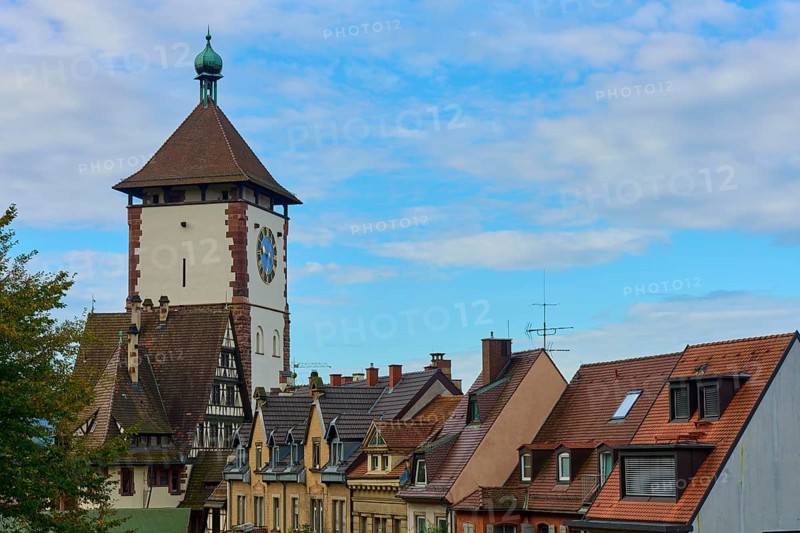 Schwabentor and half-timbered houses under a blue sky, Freiburg im Breisgau, Black Forest, Baden-Württemberg, Germany