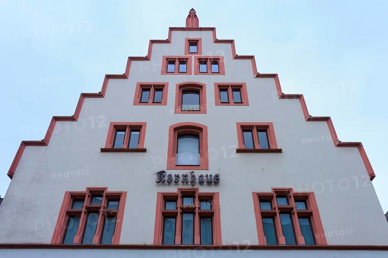 Kornhaus, north-west corner of Freiburg Minster Square, historic building with striking stepped gable and red window frames, Freiburg im Breisgau, Black Forest, Baden-Württemberg, Germany