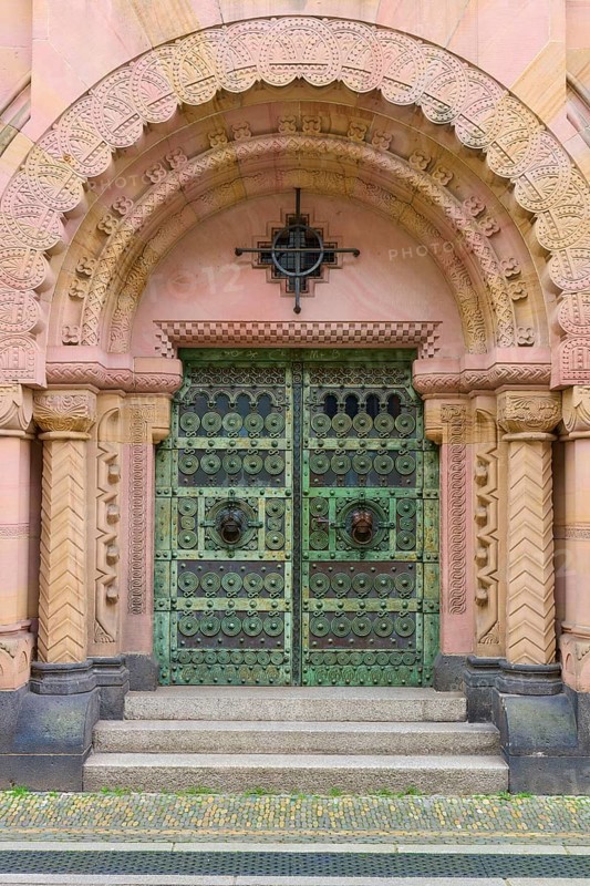 Entrance to the Archbishop's Ordinariate of Freiburg, historic ornate door under a decorative round arch, Freiburg im Breisgau, Black Forest, Baden-Württemberg, Germany