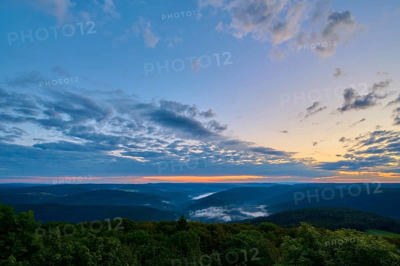 Wide landscape with wooded hills at dawn, peaceful sky with cloud formations, Katzenbuckel, Waldbrunn, Neckar-Odenwald-Kreis, Odenwald, Baden-Württemberg, Germany