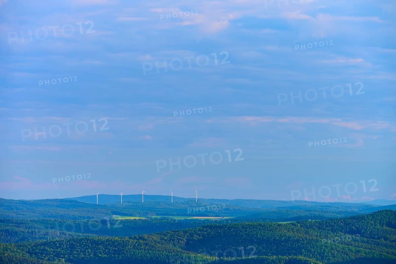 Hilly landscape with clouds, wind turbines on the horizon under a blue sky, Katzenbuckel, Waldbrunn, Neckar-Odenwald-Kreis, Odenwald, Baden-Württemberg, Germany
