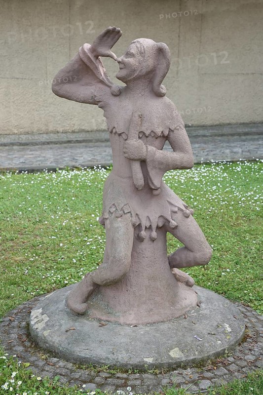 Sculpture of Till Eulenspiegel with gesture, thumb on nose, arm, high, up, hand, Bernburg, Saxony-Anhalt, Germany