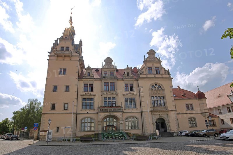 Town hall in neo-renaissance style with backlight, sunbeams, Bernburg, Saxony-Anhalt, Germany