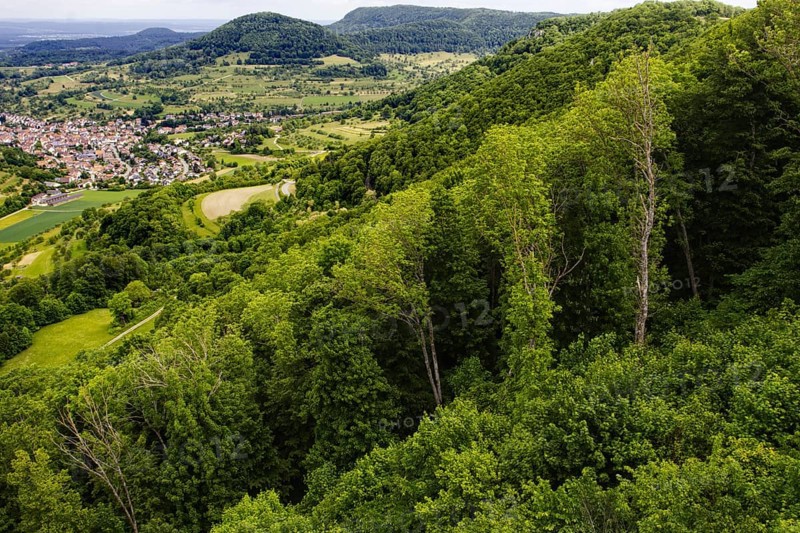View from the top of the Reußenstein castle ruins over wooded hills and the Neidlingen valley, Neidlingen