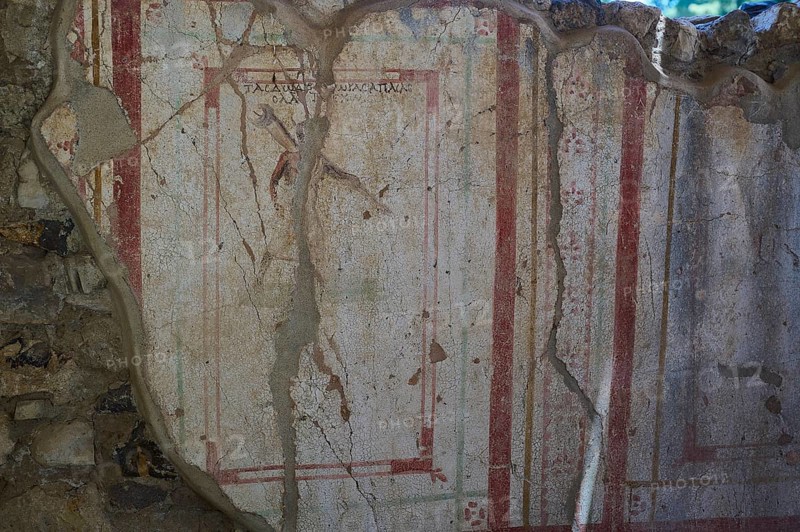 Weathered fresco with red decorative elements on ancient wall, Archaeological site, House of Beluga (sturgeon), Postman, Western Excavation, Kos Town, Kos, Dodecanese, Greek Islands, Greece