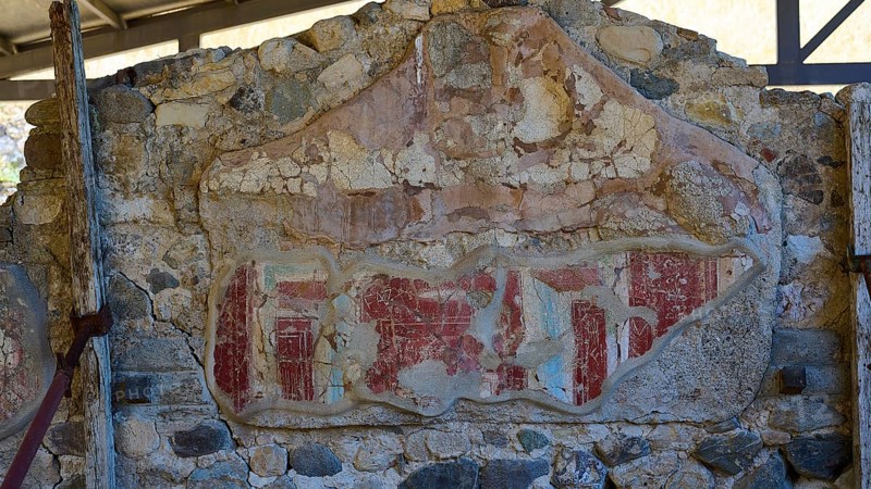 Ancient worn wall remnant with red drawings on stone wall, Archaeological site, House of Europe, Letter carrier, Western excavation, Kos town, Kos, Dodecanese, Greek Islands, Greece
