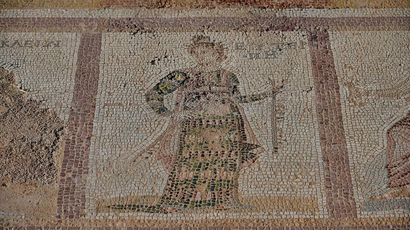 Ancient mosaic of a standing figure in a robe, partially damaged, Archaeological Site, Western Excavation, Kos Town, Kos, Dodecanese, Greek Islands, Greece