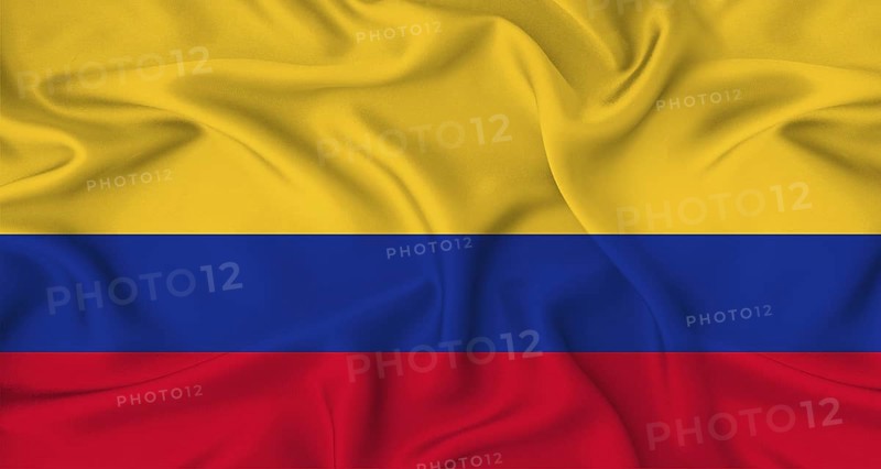 Realistic Colombia flag waving. Close up of flag of Colombia with cloth texture