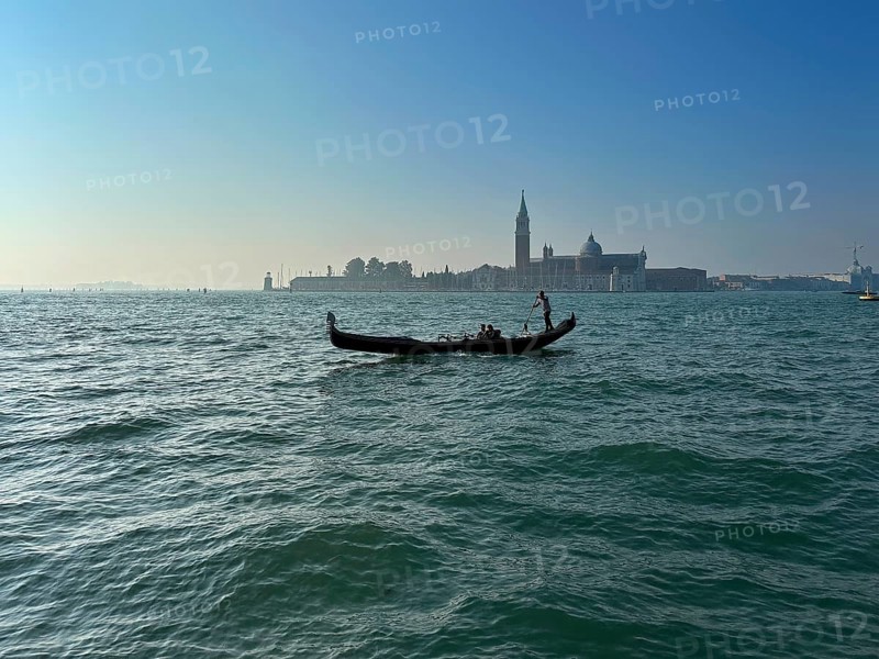 Gondola on the lagoon off Venice, lagoon city of Venice, Veneto, Italy