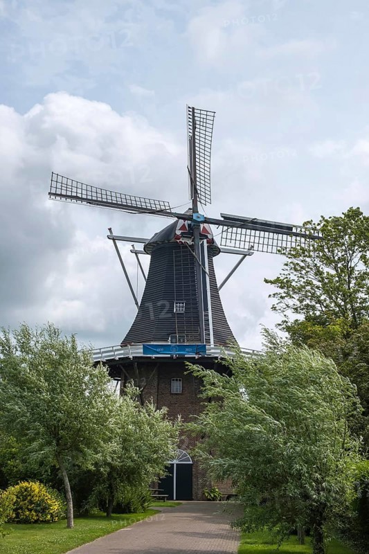 Windmill De Stormvogel (in German: The Storm Bird) octagonal tower mill, Loppersum, Eemsdelta, province of Groningen, Netherlands