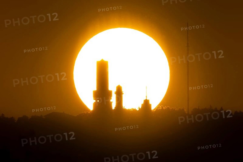 The sun sets behind the towers on the summit of the Großer Feldberg in the Taunus, Großer Feldberg in the Taunus, Schmitten, Hesse, Germany