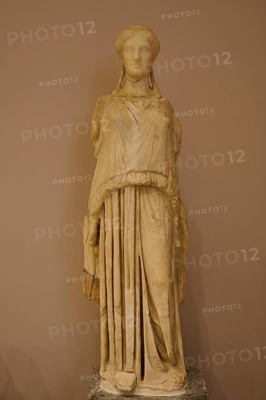 Marble sculpture of an ancient woman in elegant garb, presented in the museum, Archaeological Museum, Kos Town, Kos, Dodecanese, Greek Islands, Greece