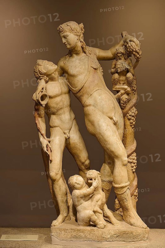 Ancient marble sculpture depicting several figures, including children and adults, satyr and Pan, panther and Cupid, Archaeological Museum, Kos Town, Kos, Dodecanese, Greek Islands, Greece
