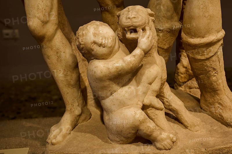 Close-up of an ancient marble sculpture of a child embracing a panther, Panther and Cupid, Archaeological Museum, Kos Town, Kos, Dodecanese, Greek Islands, Greece