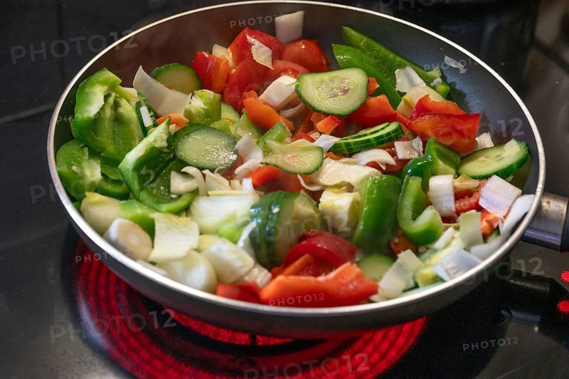 Fresh vegetables in the pan on the cooker, Bavaria, Germany