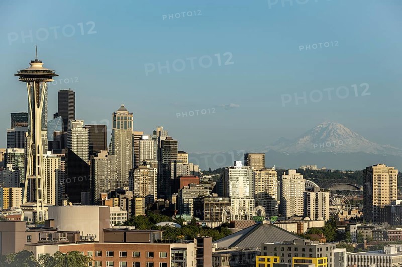 Seattle skyline at golden hour with Mt Rainier in the background, Washington, USA, North America