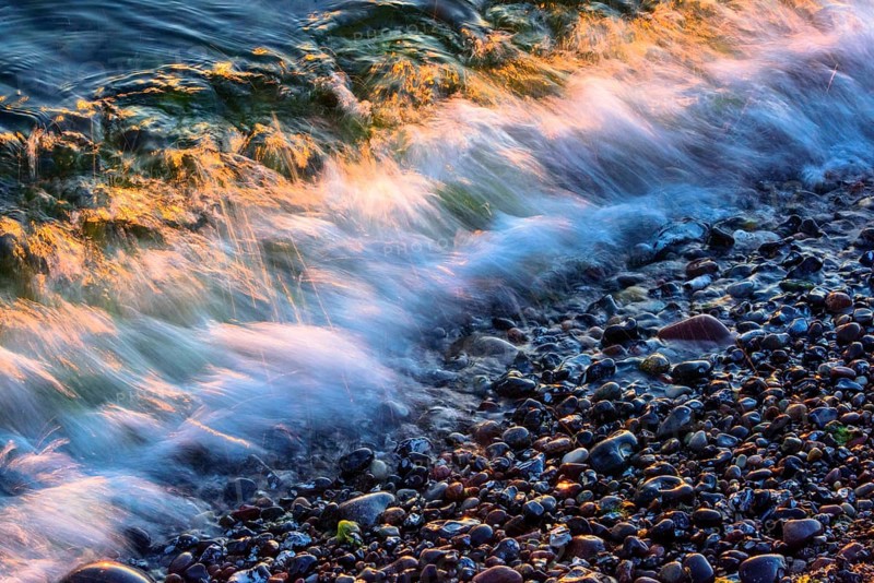 Wave play at sunrise on the chalk coast in Jasmund National Park, Rügen, Sassnitz, Mecklenburg-Western Pomerania, Germany