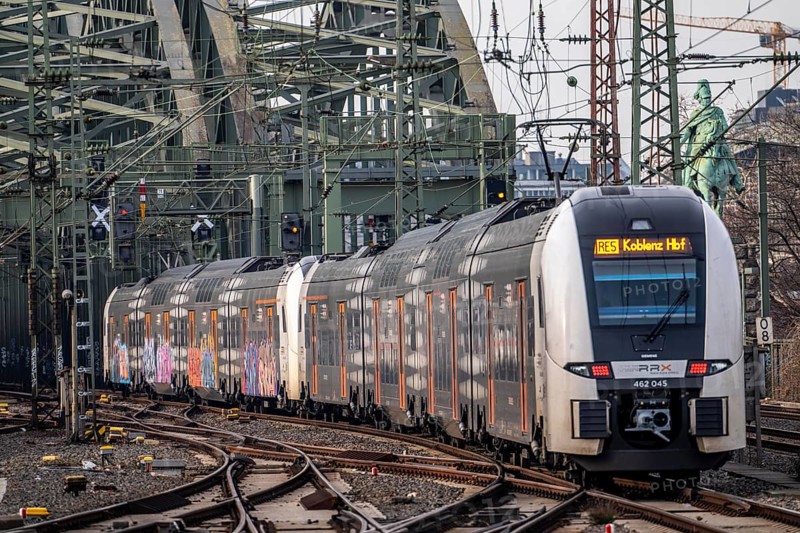 Rail system in front of Cologne Central Station, Hohenzollern Bridge across the Rhine, RRX, Rhine-Ruhr Express, regional train, regional trains, in front of the railway bridge, Cologne, North Rhine-Westphalia, Germany
