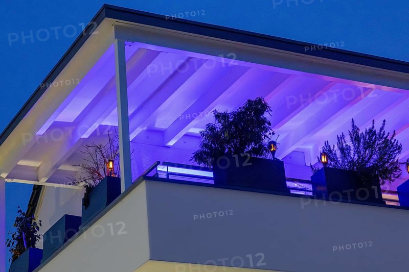 Modern roof terrace with atmospheric LED lighting in changing colors