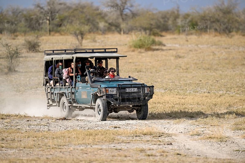 Safari vehicle with Planet Baobab guests, lodge near the village of Gweta, Makgadikgadi Pans National Park, Central District, Botswana