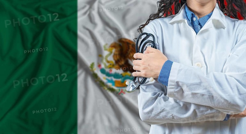 Healthcare professional with Mexico flag background. Professional doctor holding stethoscope on Mexico flag background