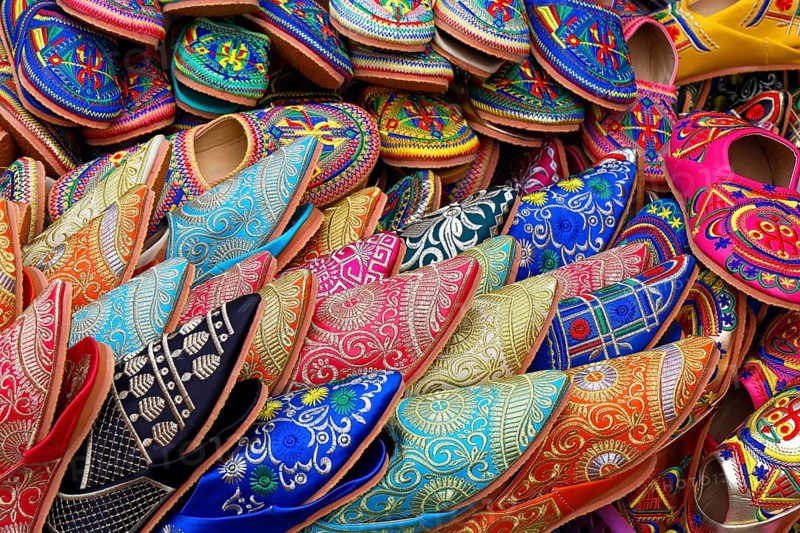 Sales stand with traditional colorful slippers at a market in Marrakech, historic old town, Medina, UNESCO World Heritage Site, Morocco