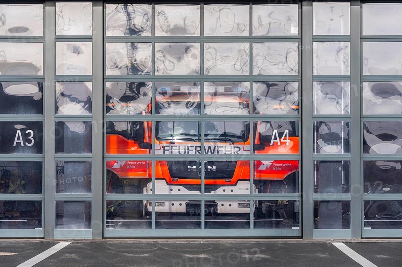 Fire department, fire station, modern guard, silver façade, glass gates, emergency vehicle, fire and rescue station 10, Gummersbacher Straße, Cologne, North Rhine-Westphalia, Germany