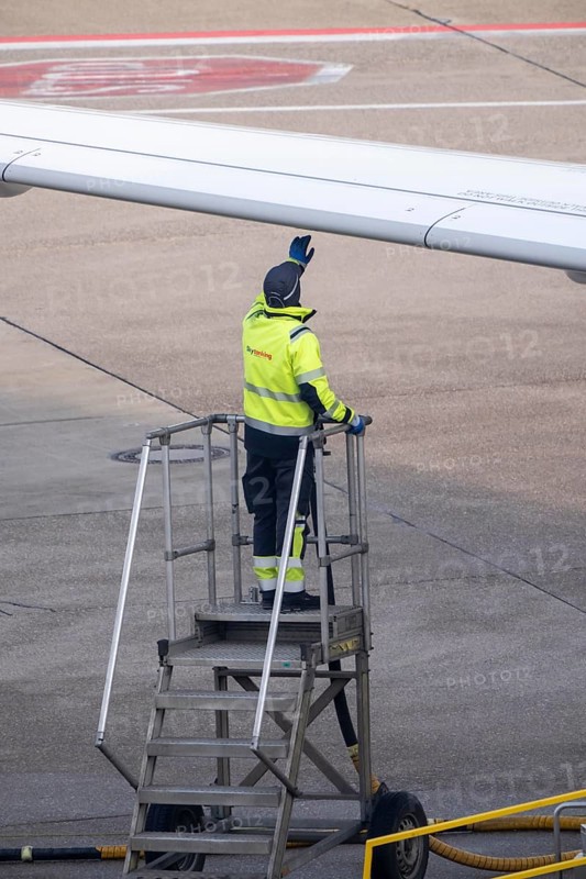 Refueling an aircraft after landing, in front of takeoff, air fuel, kerosene, Skytanking tank truck at the parking position, at the terminal, gate, at the Cologne/Bonn airport, CGN, North Rhine-Westphalia, Germany